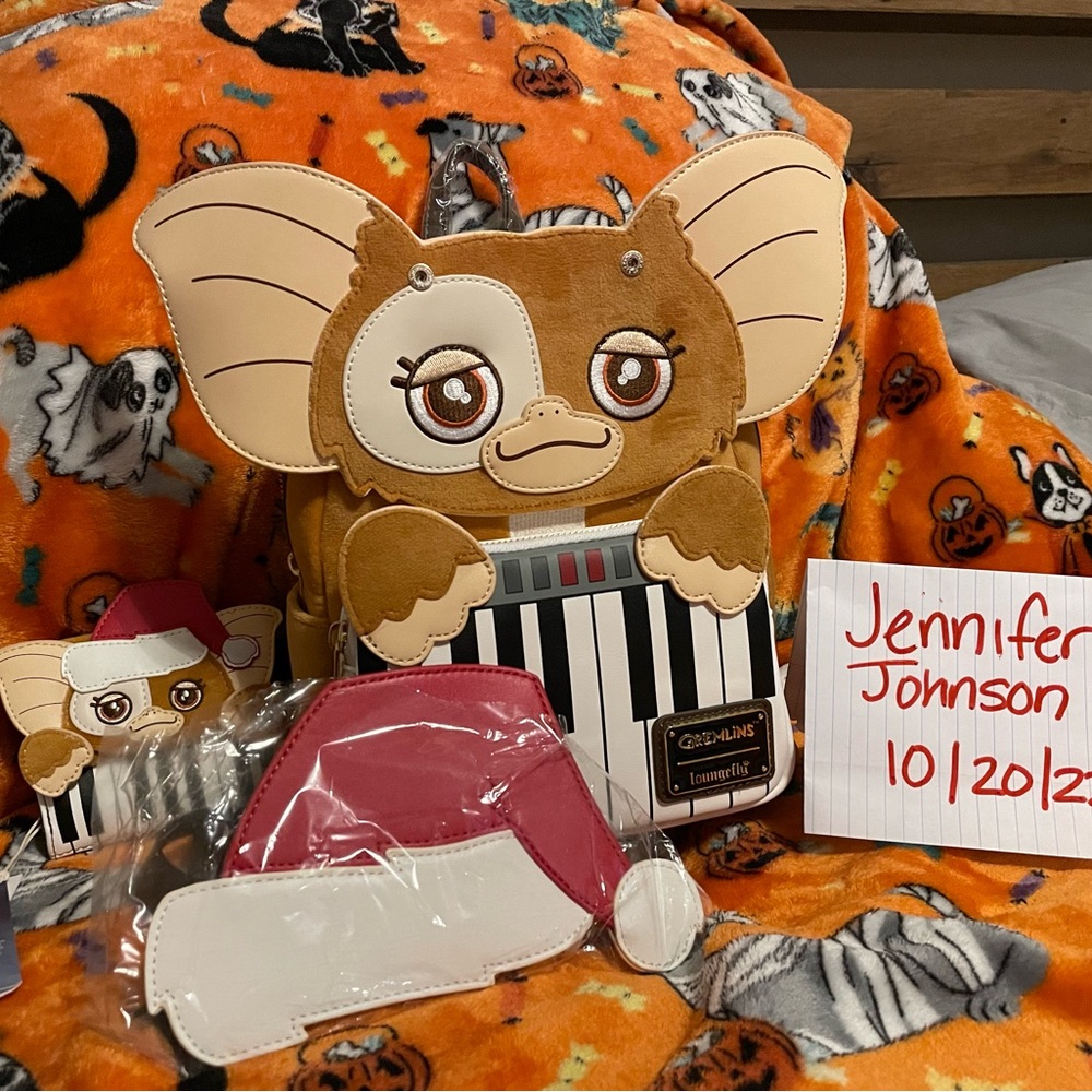 Loungefly Gizmo backpack with small matching wallet.